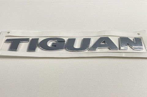 Емблема напис TIGUAN на Volkswagen (Фольцваген) (5N0853687A739) vw024 фото товару