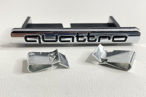 Эмблема надпись Quattro на решетку радиатора Audi 72x15mm au005 фото товара