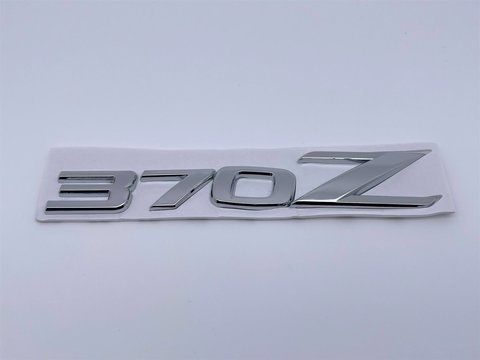 Емблема шильдик логотип напис 370Z на кришку багажника Nissan (Нісан) 140*25 мм (Хром) (848951EA0A) nis027 фото товару