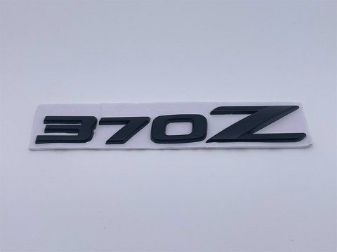 Емблема шильдик логотип напис 370Z на кришку багажника Nissan (Нісан) 140*25 мм (Чорний матовий) nis028 фото товару